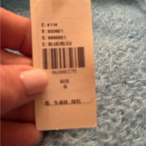 Anthropologie Light Tiffany Blue Fuzzy Knit Cardigan
Smoke and pet free home